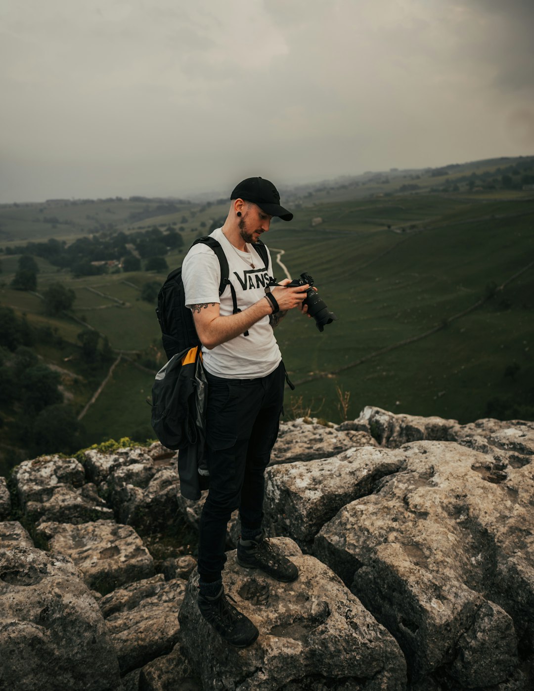 Photographer assessing gear needs